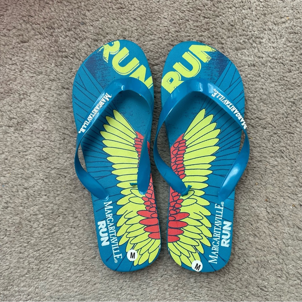 Margaritaville Blue Flip Flops with Wing Pattern
